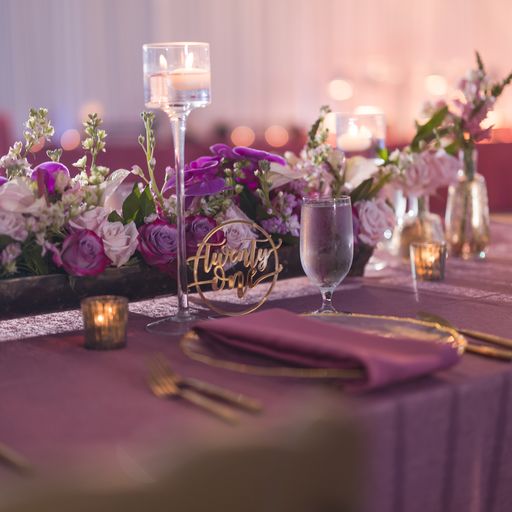 Mauve and gold wedding reception tablescapes at a Ritz Carlton Sarasota South Asian wedding
