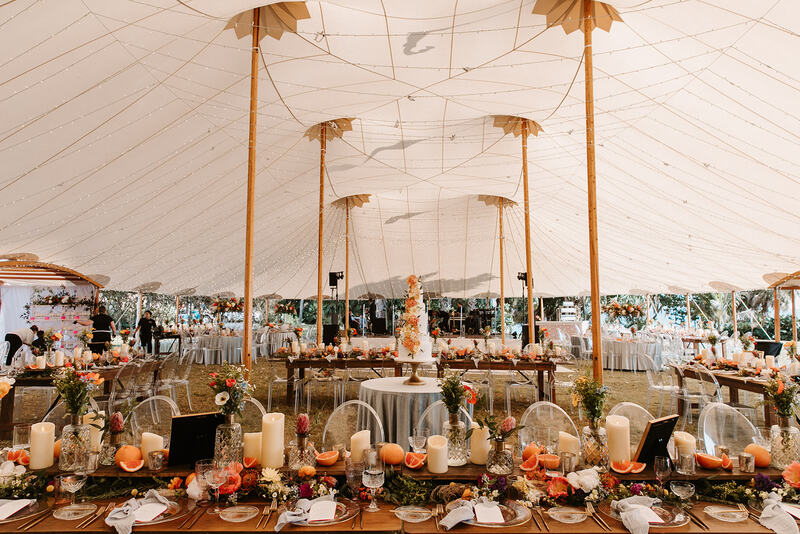 sailcloth ten at Powel Crosely Estate decorated with Chic wedding reception decor with bold colors and fresh citrus