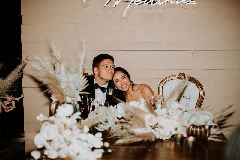 Bride and groom at their sweet heart table