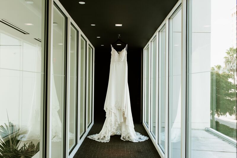 bride's wedding gown photographed on the hotel 's balcony
