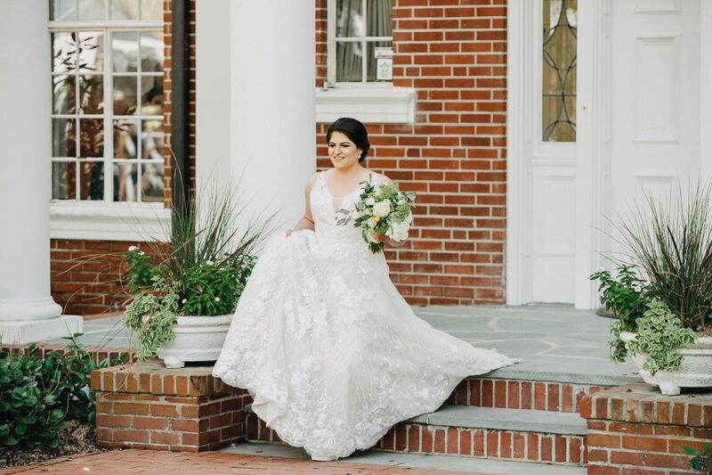 Bay Preserve at Osprey -Bay Preserve wedding – Sarasota wedding – Sarasota wedding planner – Sarasota luxury wedding planner - bride heading to see groom - bride with white bouquet with kumquats