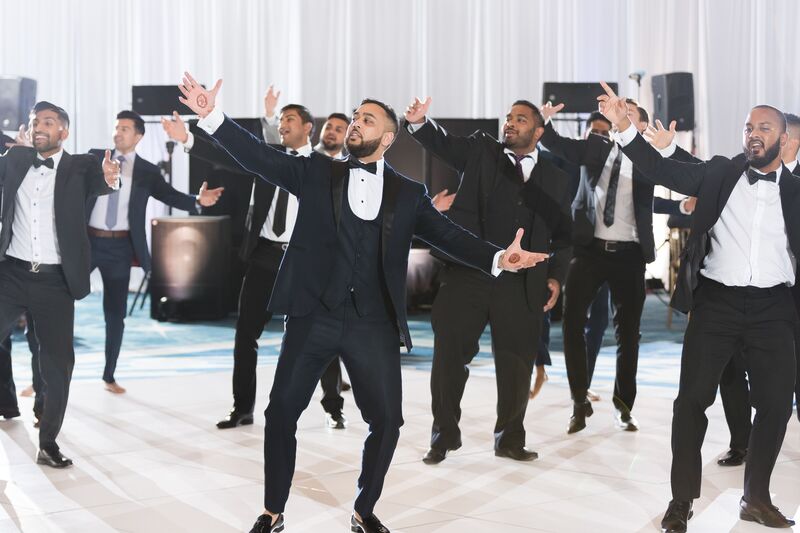Groom and Groomsmen's dance performance during a three day wedding reception