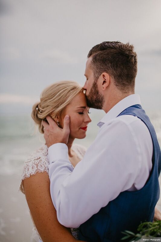 Bride and groom on the Beach at Sunset Beach Resort 