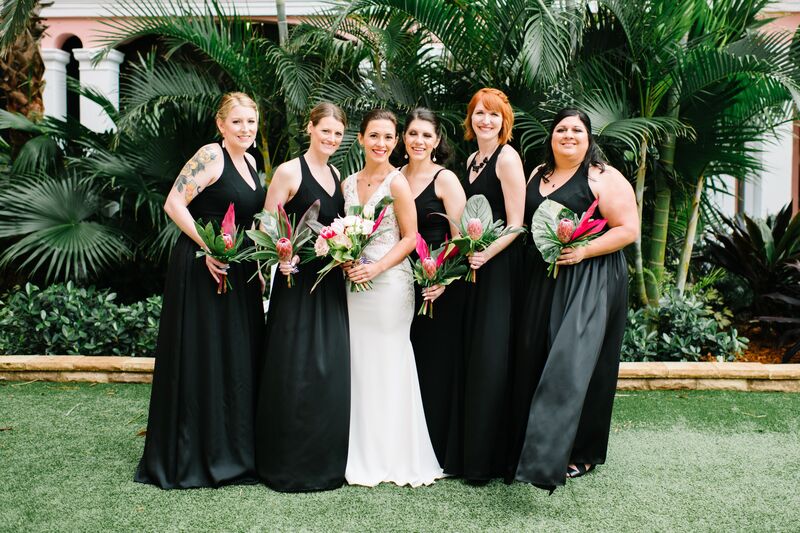 Jennifer Matteo Event Planning  - Pass A Grille wedding – Red Mesa Cantina wedding reception – Tropical wedding – St Petersburg wedding -
bride- bridesmaids- wedding party with tropical bouquets- black bridesmaids dresses