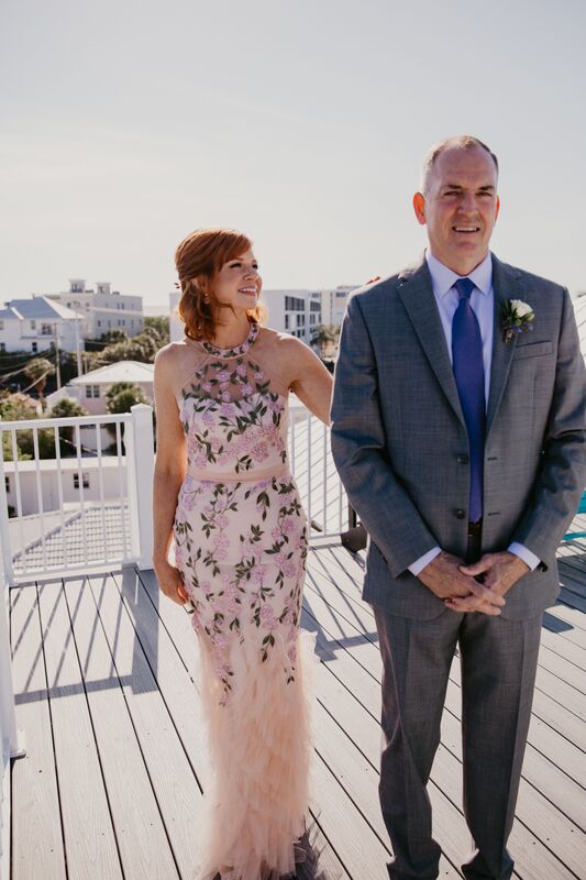 Sarasota bride and groom having gorier first look on the rooftop
