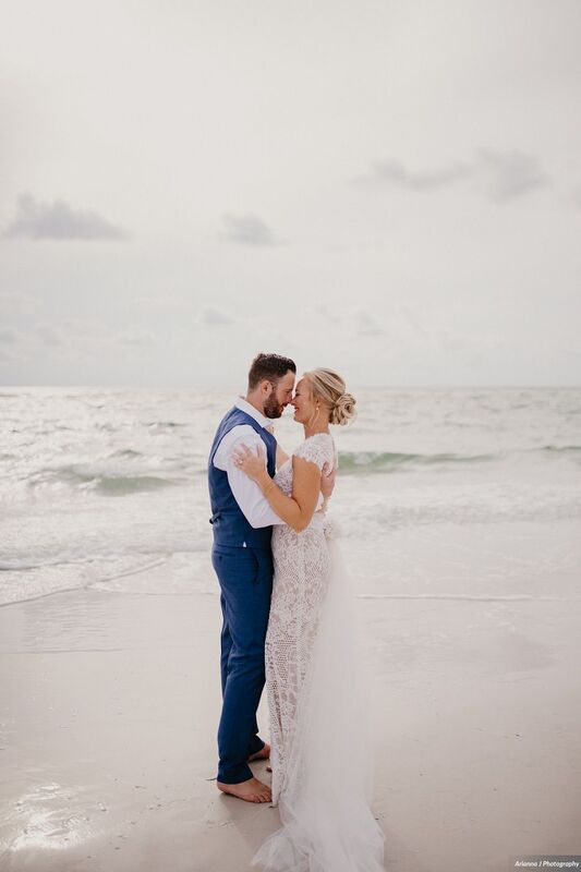 Bride and groom on the Beach at Sunset Beach Resort 