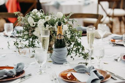 Jennifer Matteo Event Planning – Sarasota Wedding Planner- Selby Garden Wedding -rustic garden wedding - greenery centerpieces with white and gold