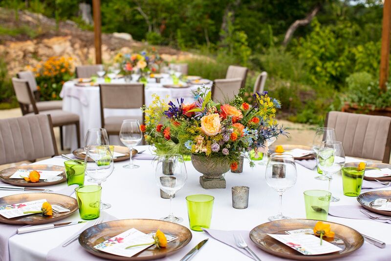 round tables set for intimate wedding reception