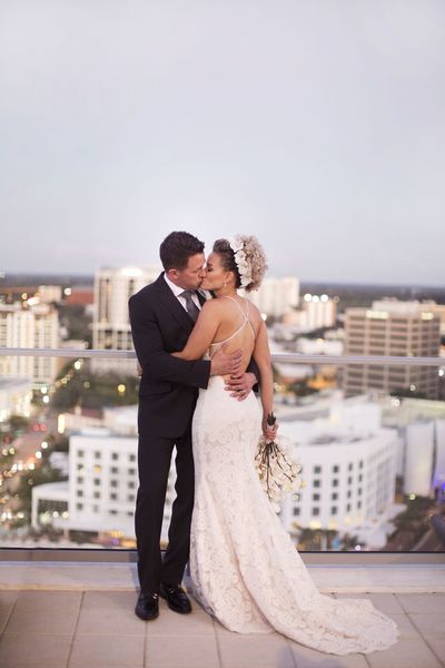 Jennifer Matteo Event Planning  - Sarasota wedding planner- Westin Sarasota – rooftop wedding-first kiss