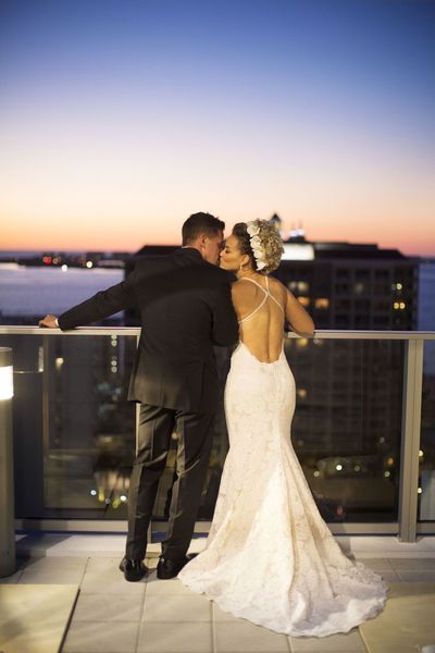 Jennifer Matteo Event Planning  - Sarasota wedding planner- Westin Sarasota – rooftop wedding- bride and groom at sunset