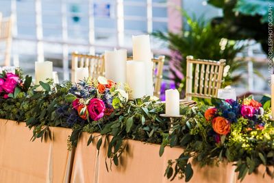 Jennifer Matteo Event Planning – Indian Weddings – Florida Indian wedding planner – Florida Indian weddings - head table with lush greenery
