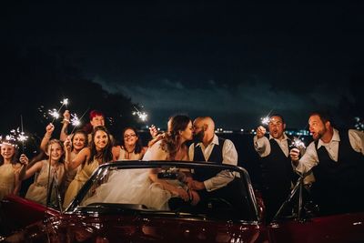 Jennifer Matteo Event Planning – Sarasota Wedding Planner- Mote Marine Laboratory – Longboat Island Chapel  - Florida Luxury Wedding Planner - sparkler exit - bride and groom in vintage car