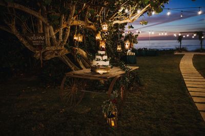 Jennifer Matteo Event Planning – Florida wedding planner – Sarasota wedding planner – Sarasota luxury weddings – Siesta Key wedding – Sarasota boho wedding - hanging lanterns - wedding cake