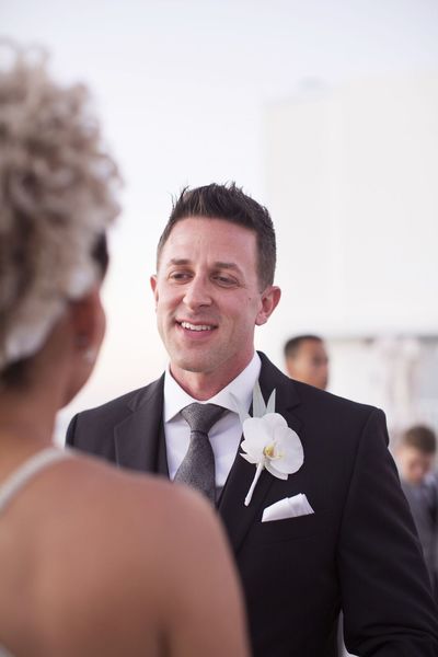 Jennifer Matteo Event Planning  - Sarasota wedding planner- Westin Sarasota – rooftop wedding- exchanging vows